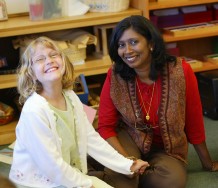Lower Elementary Teacher with student