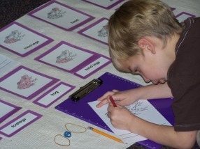 child learning parts of a frog